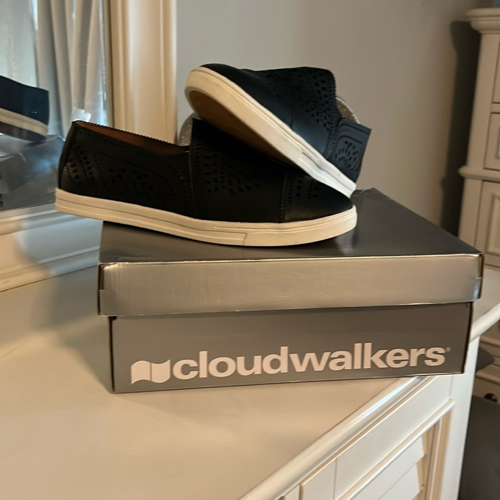 Cloudwalkers , size 9 and black and white around the rims